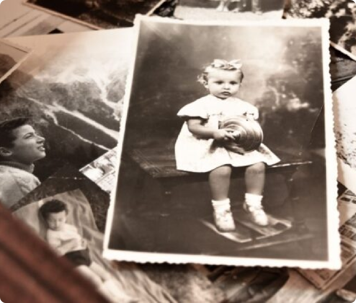 A pile of vintage photographs