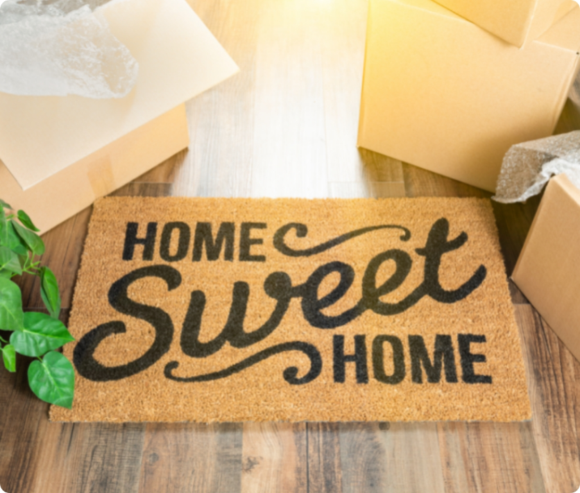 A doormat that says Home Sweet Home